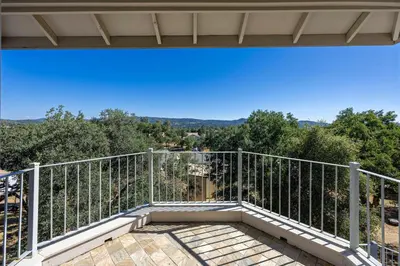 a view from the balcony of a house at Hemlock Hacienda in Groveland