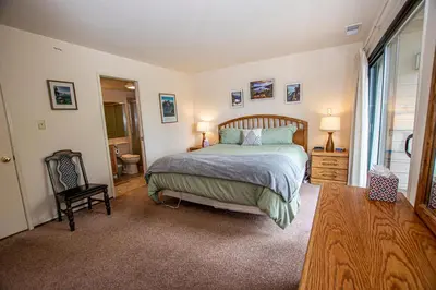a bedroom with a bed and a window at Carnelian Woods #128 By Hauserman Rentals in Carnelian Bay