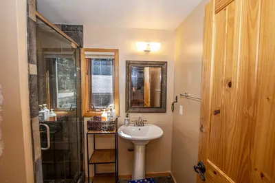 a bathroom with a sink and a shower at Bonanza By Hauserman Rentals in Tahoe City