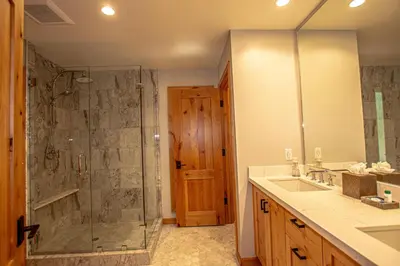 a bathroom with a shower and a sink at Coates By Hauserman Rentals in Tahoe City