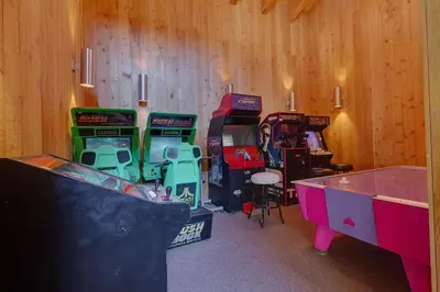 a room with a bunch of video game machines at Carnelian Woods #126 By Hauserman Rentals in Carnelian Bay