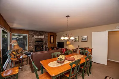 a dining room with a table and chairs at Holland By Hauserman Rentals in Homewood