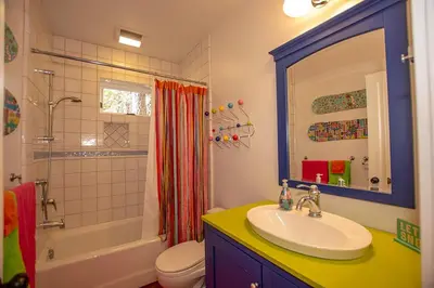 a bathroom with a sink and a toilet and a shower at Snowglobe By Hauserman Rentals in Tahoe City