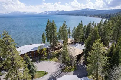 an aerial view of a house on the shore of a lake at Star Harbor # 4 By Hauserman Rentals in Tahoe City
