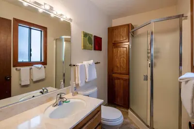 a bathroom with a sink and a shower and a toilet at St Francis #14 By Hauserman Rentals in Tahoe City