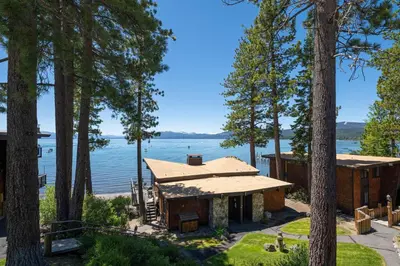 a house with a view of the water at Star Harbor # 6 By Hauserman Rentals in Tahoe City