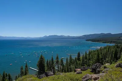a view of a lake with boats in the water at Rocky Ridge # 04 By Hauserman Rentals in Tahoe City