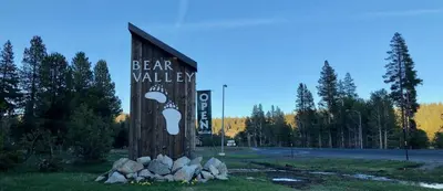 a sign for a bear valley sign on a pole at Cozy Condo with Fireplace - Tamarack 3 in Bear Valley