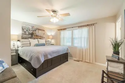 a bedroom with a bed and a ceiling fan at Truckee Mountain Retreat Family Friendly 3BR 2BA in Truckee