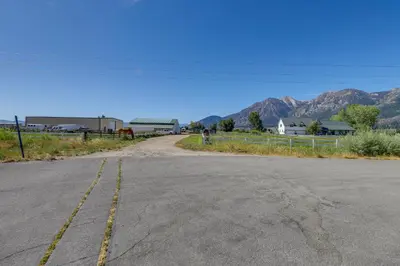 an empty road with mountains in the background at 11 Mi to Heavenly Resort Pet-Friendly Tiny Home in Gardnerville