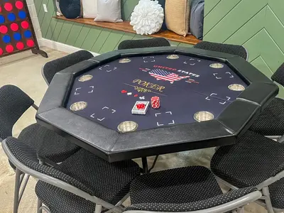 a poker table in a room with chairs at Yosemite Family Lodge I Sleeps 11 I Game Room in Oakhurst