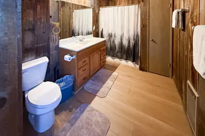 a bathroom with a toilet and a sink at Vernal Vista in Yosemite West
