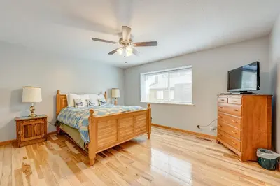 a bedroom with a bed and a flat screen tv at Blue Lake Bliss in Tahoe City
