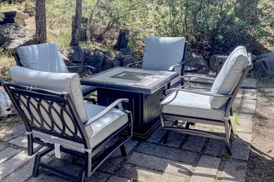 a group of three chairs and a table with a grill at The Chalet at Kings Beach Unit 6 in Kings Beach