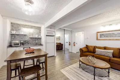 a living room with a couch and a table at Sierra Townhome in Incline Village