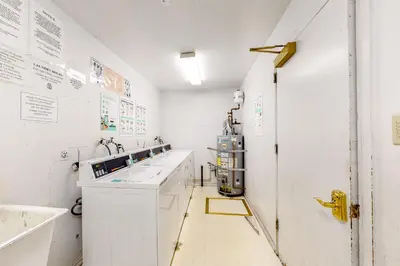 a white bathroom with a sink and a counter at Sierra Townhome in Incline Village