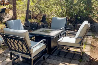 a group of three chairs and a table with at The Chalet at Kings Beach Unit 8 in Kings Beach