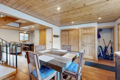 a kitchen and dining room with a table and chairs at Lake Forest Manor in Tahoe City