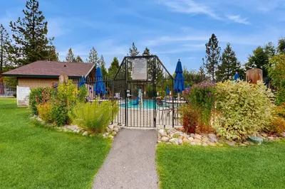 a gate in a yard with a pool at Lake Forest Manor in Tahoe City
