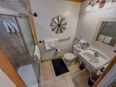 a bathroom with a shower and a toilet and a sink at The Chalet at Kings Beach Unit 7 in Kings Beach