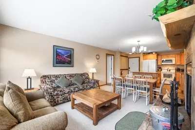 a living room with a couch and a table at 2 Bedroom Kirkwood Condo – Across the Street from Village condo in Kirkwood