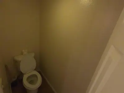 a bathroom with a white toilet in a room at Rr-interlaken 09 in June Lake