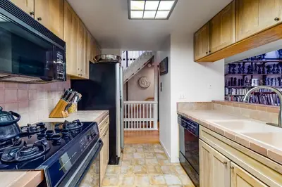 a kitchen with a stove and a sink at Tahoe Safari in Incline Village