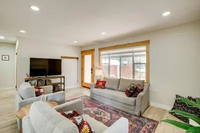 a living room with two couches and a tv at Work and Play! Lake Tahoe Cabin 5 Mi to Heavenly Mtn in South Lake Tahoe