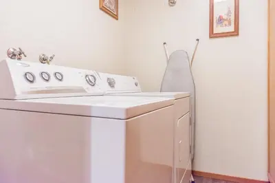 a white washer and dryer in a room at Snowcreek #474 in Mammoth Lakes