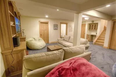a living room with a couch and a table at COH1444 - Fallen Leaf Relief home in South Lake Tahoe