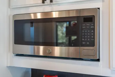 a stainless steel microwave oven in a kitchen at HCH0868 - The Grand Escape home in South Lake Tahoe