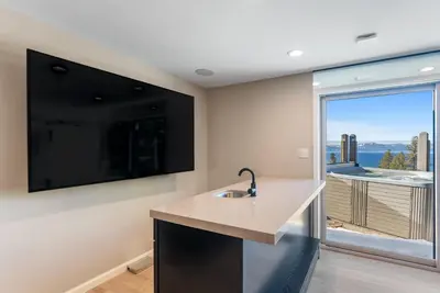 a kitchen with a sink and a large window at HCH0868 - The Grand Escape home in South Lake Tahoe