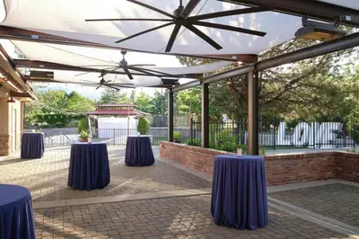 a set up for a wedding under a marquee with purple tables at Residence Inn by Marriott Reno South in Reno