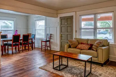 a living room with a couch and a table at 2BR Family Getaway with Yard Kitchen and Parking in Lodi