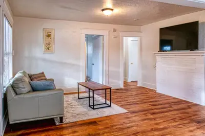 a living room with a couch and a table at 2BR Family Getaway with Yard Kitchen and Parking in Lodi