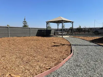 a gazebo with a picnic table in a park at Cozy Entire Home Gateway to Sequoia Pet Friendly in Visalia