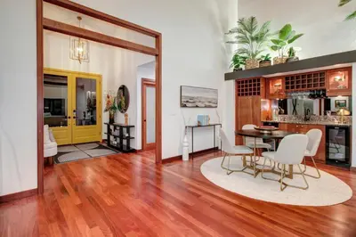 a living room with a table and chairs at Elegant Granite Bay Getaway Tall Pine Home in Granite Bay