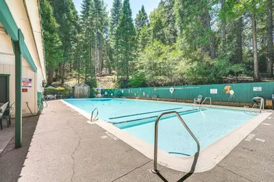 a large swimming pool in a building at Hike, Swim, Golf Family Retreat in Arnold! in Arnold