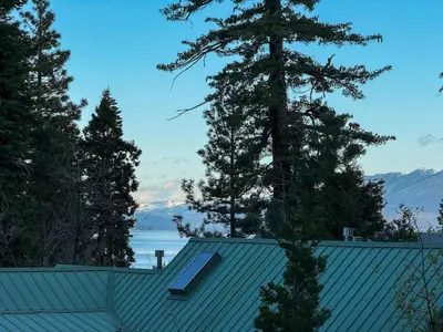 a view of a house with a roof and trees at Walk to Lake 4BR Memory Making Alpine Retreat in Tahoe City