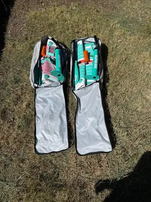 two white bags sitting on top of the grass at Walk to Lake 4BR Memory Making Alpine Retreat in Tahoe City