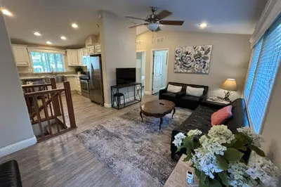 a living room with a couch and a table at Sierra Solace in South Lake Tahoe