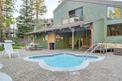 a small swimming pool in front of a building at St Anton Condo in Mammoth Lakes! in Mammoth Lakes
