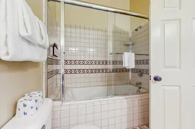 a bathroom with a tub and a toilet at My Tahoe Sanctuary in South Lake Tahoe
