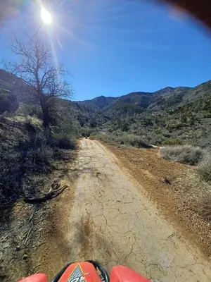 a dirt road in the middle of a desert at Mountain Top Barn retreat with View in Bodfish