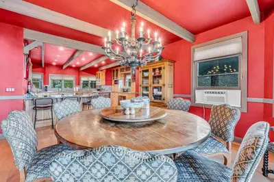 a dining room with a wooden table and chairs at South Tahoe Haven Views Comfort Fun in South Lake Tahoe