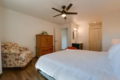 a bedroom with a bed and a ceiling fan at Quiet Home with Yard 2 Mi to Mall and Sparks Marina! in Sparks