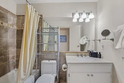 a bathroom with a sink and a toilet and a shower at Comfort in the Sierras - Edelweiss 2BR - Kirkwood condo in Markleeville