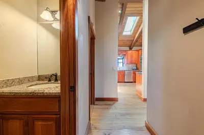 a bathroom with a sink and a mirror at Twin Hollow at Dollar Point by Tahoe Getaways - 5BR w Game Room & Hot Tub in Tahoe City