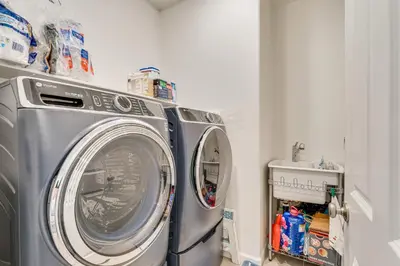 a washer and dryer in a small room at Newly Built Home with Patio 4 Mi to Dtwn Hollister in Hollister