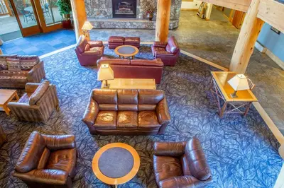 an overhead view of a living room with leather furniture at Ski in/Out 1B/1BA w/ View - Pool, Jacuzzi, Parking in Mammoth Lakes